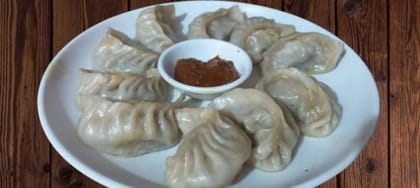 Steamed Vegetable Momos with Chutney - 80 kg - One pack of steamed momos with chutney