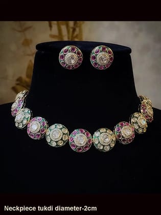 Circular tukdi ruby stone and green enamel sleek kundan set with maangtika