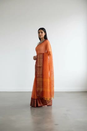 Handwoven Kanchipuram Cotton-Silk Saree in Orange with Golden Border Handwoven Kanchipuram Cotton-Silk Saree in Orange with Golden Border