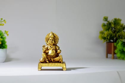 Brass Kuber sitting statue Idol (Color - Golden, Size - 3.5H * 2L * 1.75B) by Snova Enterprises