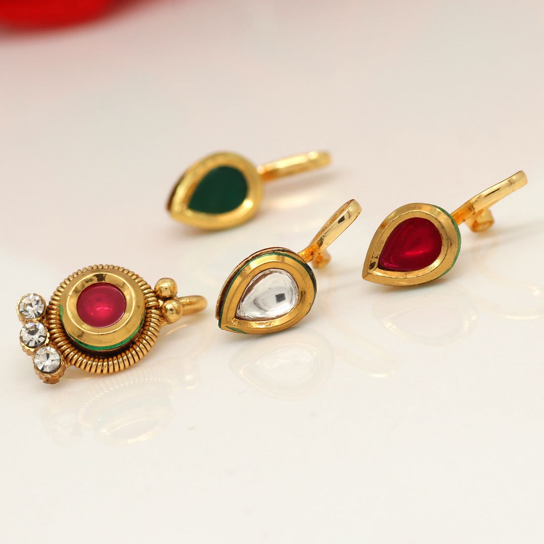 Multi Color Kundan Nose Pin Combo Of 4 Pieces (NSP180CMB)-Length: 1.60 CM x Width: 0.50 CM / Gold / Alloy With Good Quality Gold Plated