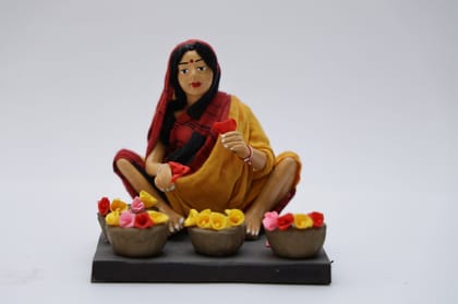Village Worker (Lady selling flowers)