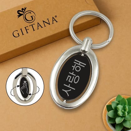 Rotating Oval Metal Keychain : Sleek Black Finish Accessory