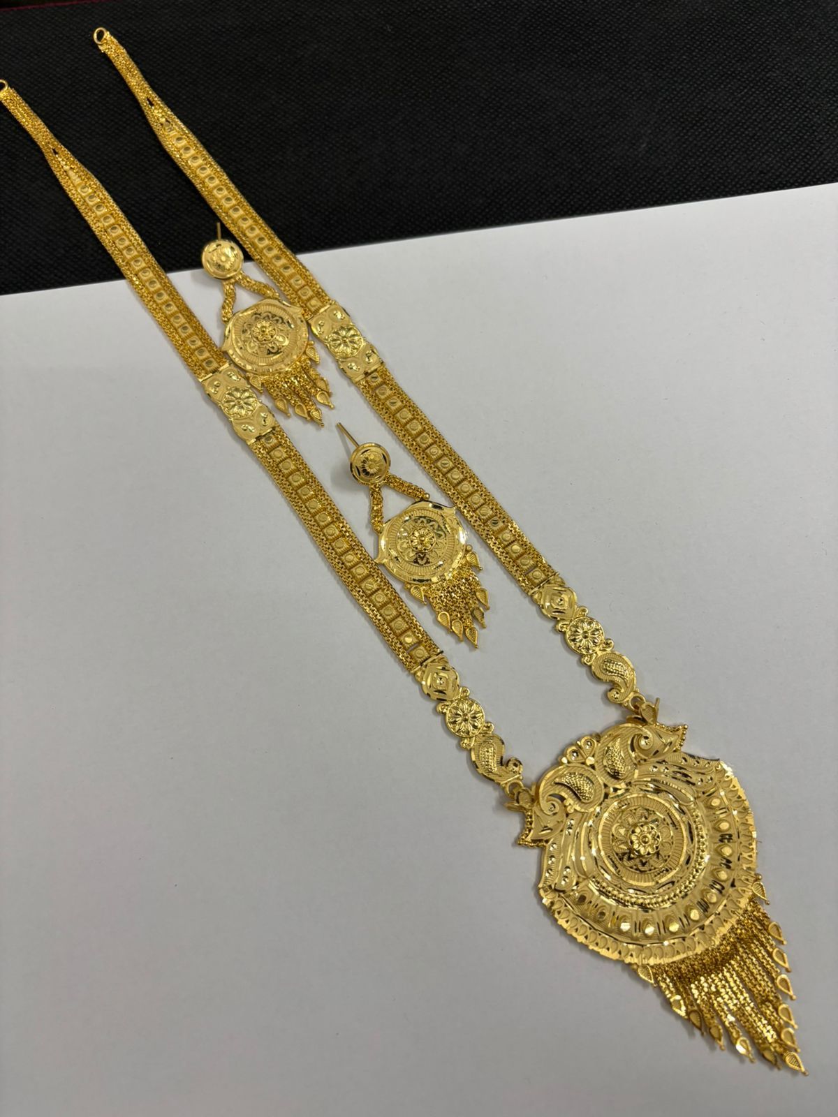 Saniya Opulent Filigree Gold Plated Long Necklace Set with Grand Circular Pendant and Tassel Earrings