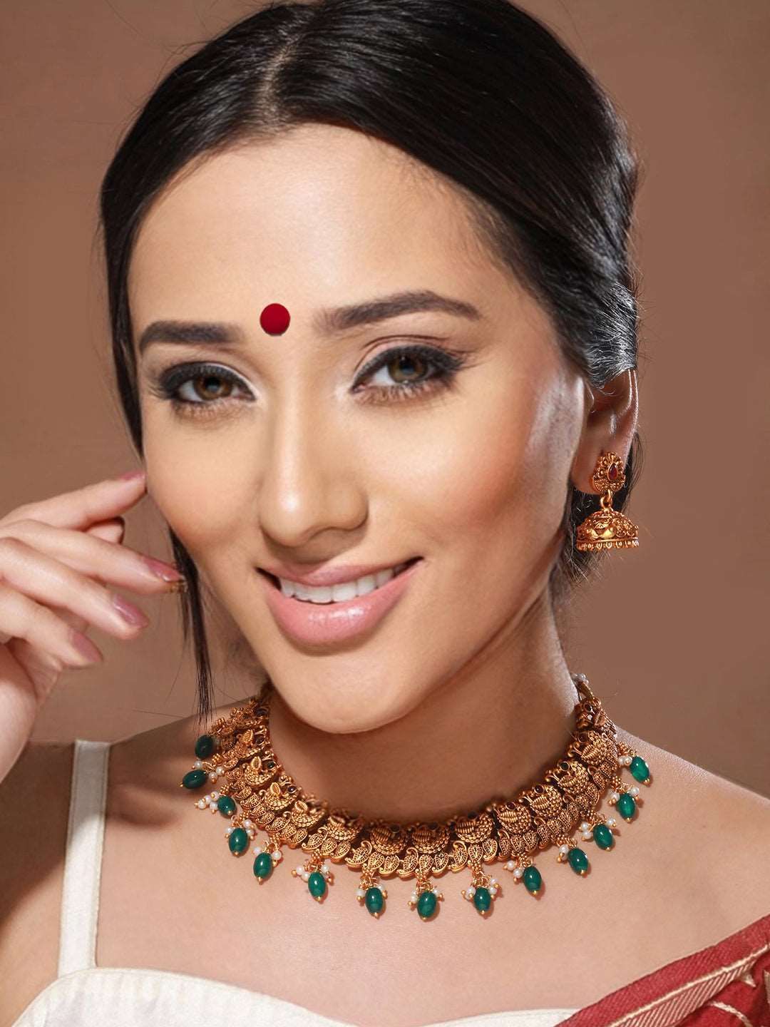 Gold Plated Green Stone Studded Peacock temple Jewellery Set