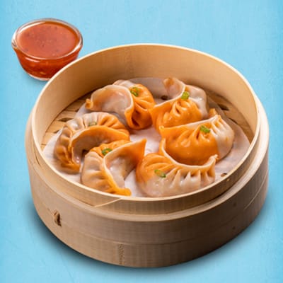 Schezwan Chicken Momo With Momo Chutney (Choose Steamed/ Fried)
