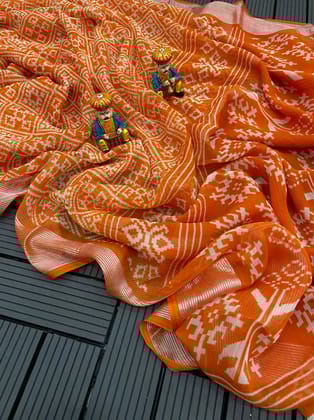 soft chiffon saree with beautiful bandhini print and zari border.