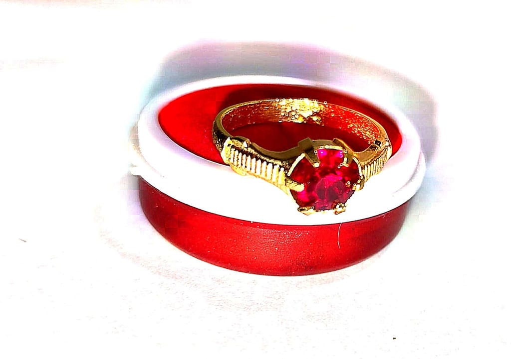 "Stunning Gold Ring with Red Gemstone"