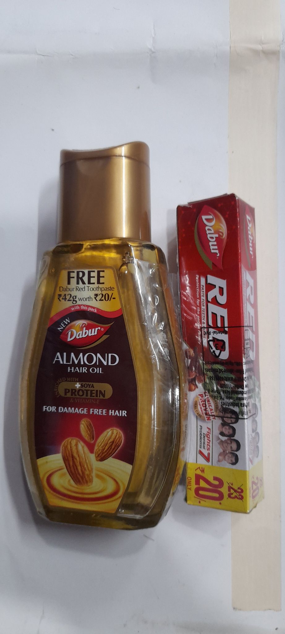 Dabur almond hair oil soya protein with free tooth paste 