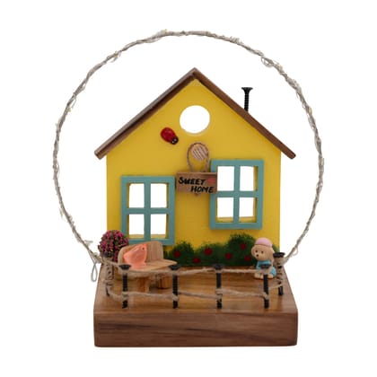 The Weaver's Nest Yellow Cottage with String Lights
