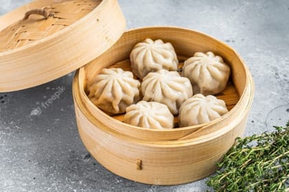 Steamed mixed veg momos [8 pieces]