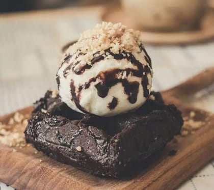 Walnut Brownie With Vanilla Ice Cream & Hot Choc Sauce