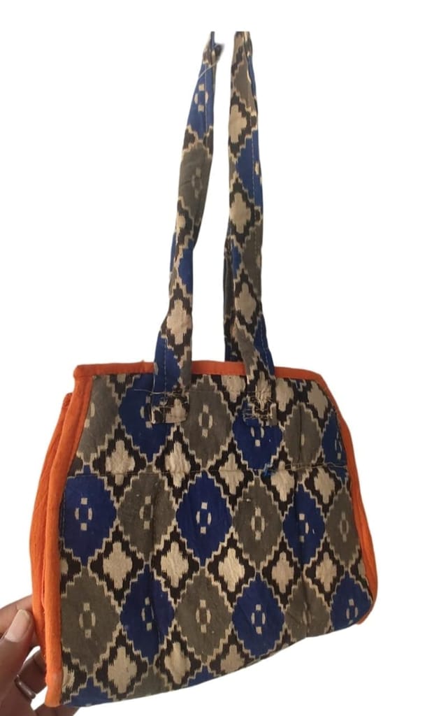 KALANKARI  Quilted cotton tote bag with blue and brown geometric print and orange lining