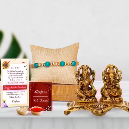 Designer Pearl Rakhi with Golden Goddess Laxmi With Lord Ganesha Idol Metal Decorative Showpiece with Diya and Roli Chawal Pack, Best Wishes Greeting Card