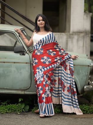 Bold & Beautiful: Red Linen Saree with Large Floral Motifs & Striped Border |  Party Collection