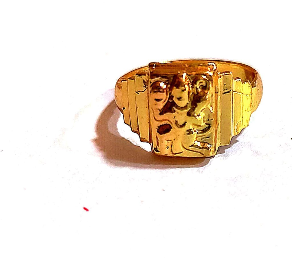 "Golden Ring with Intricate Design"