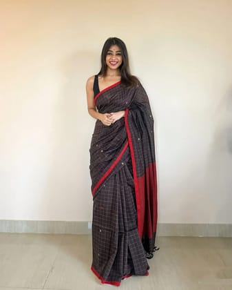 KT designSpotlightHandloom jacquard woven mercerised cotton saree with ghicha yarns in a checkered pattern, adorned with woven butas
