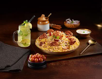 Signature Chicken Biryani + Gulab Jamun + Lemonade + Raita