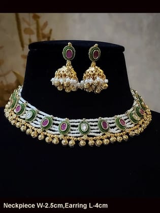 Kundan and oval ruby stone cheed strings set with gold bead hanging