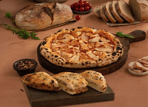 Sourdough Chicken Loaded Pizza + Mini Garlic Bread.