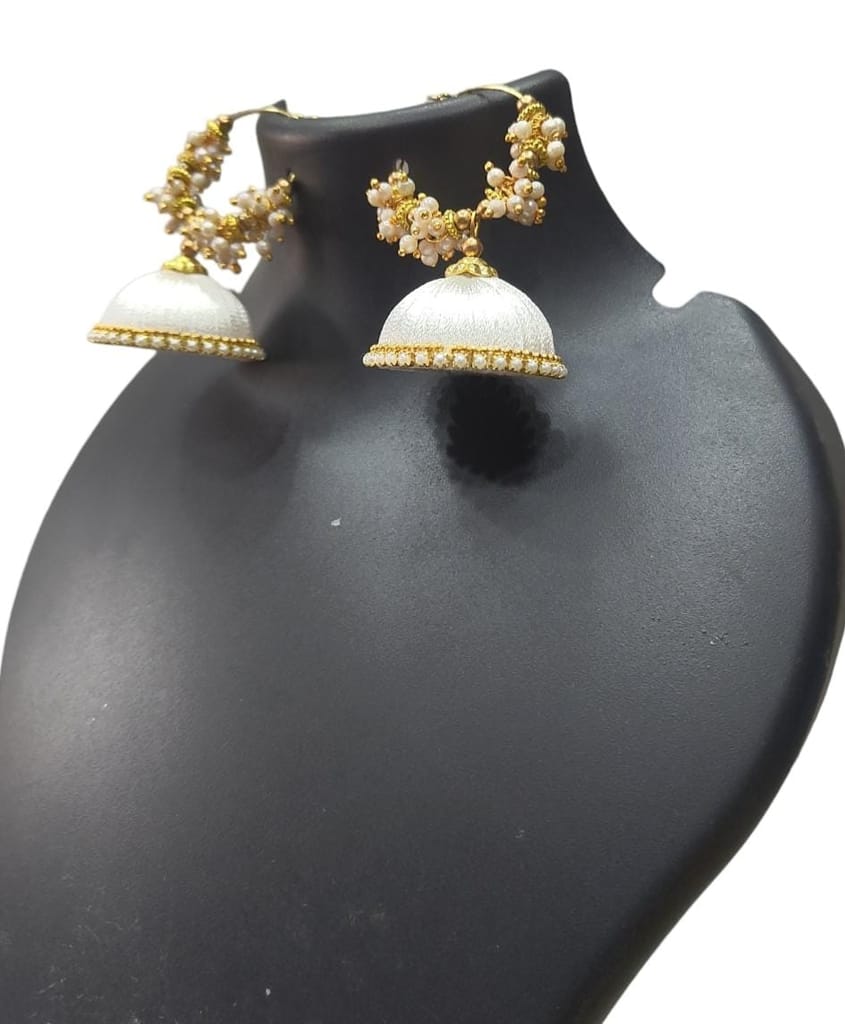 White Jhumka Earrings with Pearl and Gold Accents