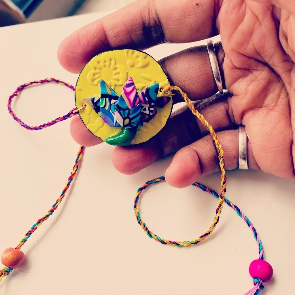 Lotus Clay Rakhi - 1 piece