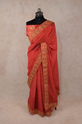 Red chiffon bandhani saree with sequence border