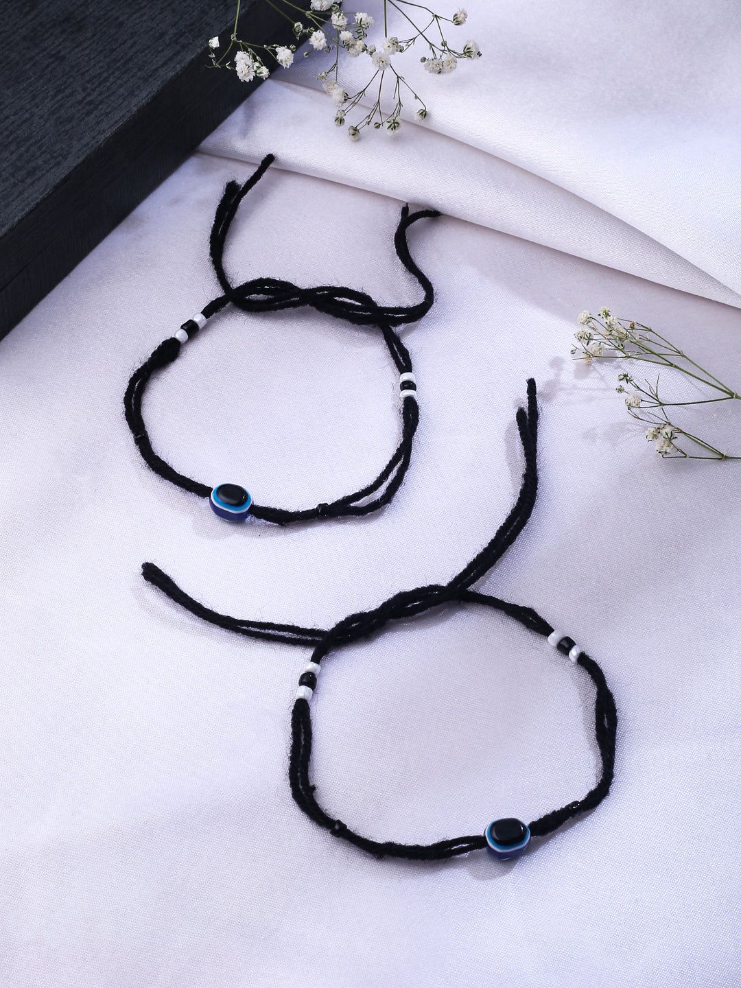 NVR Unisex Set of 2 Black Evil Eye Rakhi With Roli Chawal-Freesize / Black / Plastic