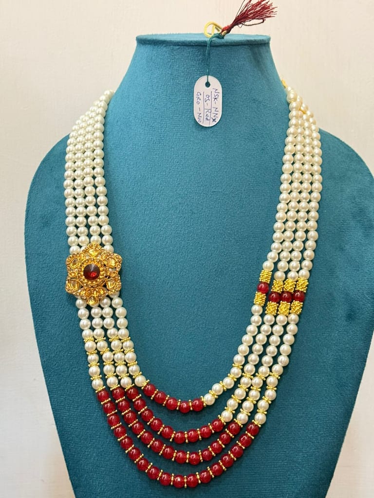 royal dulha haar with prominent red bead bottom layers and golden side panel accent