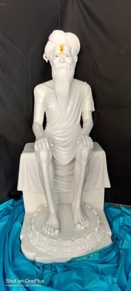 Serene Spiritual Master in White Marble