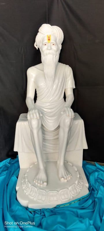 Serene Spiritual Master in White Marble