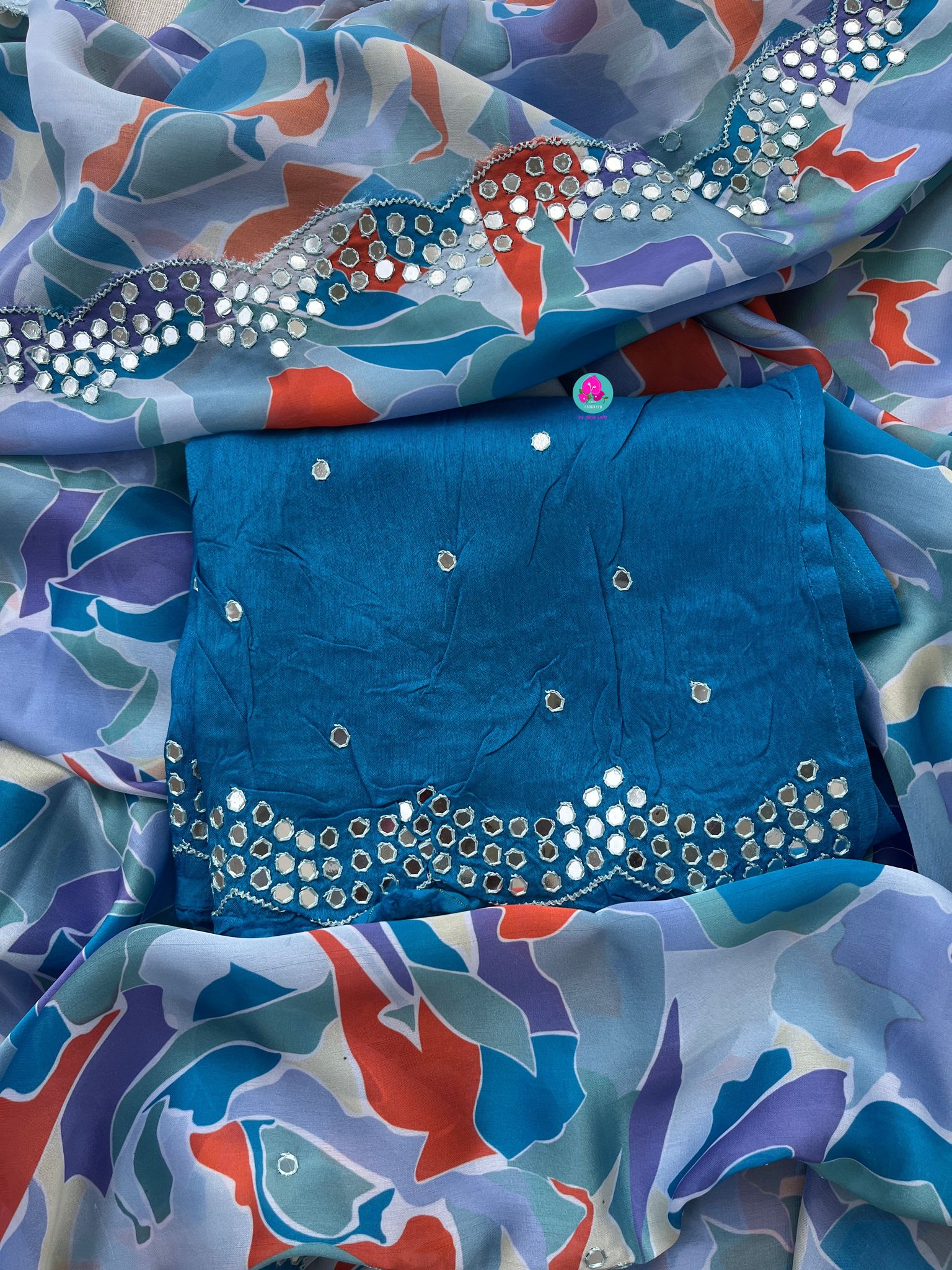 Blue saree with scaloped mirror border
