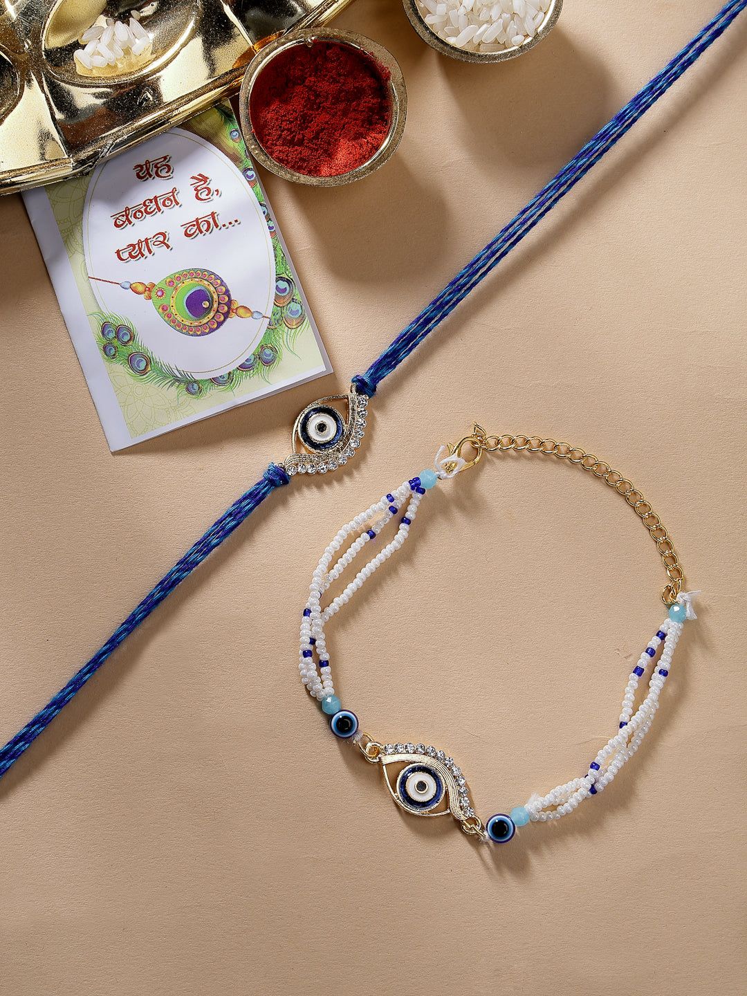 NVR Unisex Set of 2 Blue Evil Eye Bhaiya Bhabhi Rakhi Set With Roli Chawal & Chocolate-Freesize / Blue / Brass