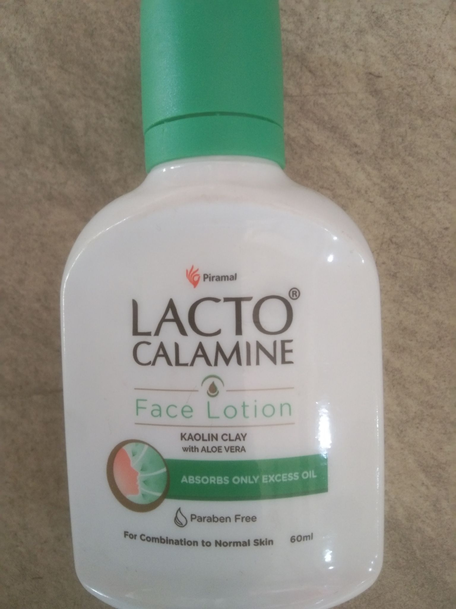 Lacto Calamine Face lotion Kaolin clay With aloe vera Absorbs only excess o For combination to normal skin 60ml 