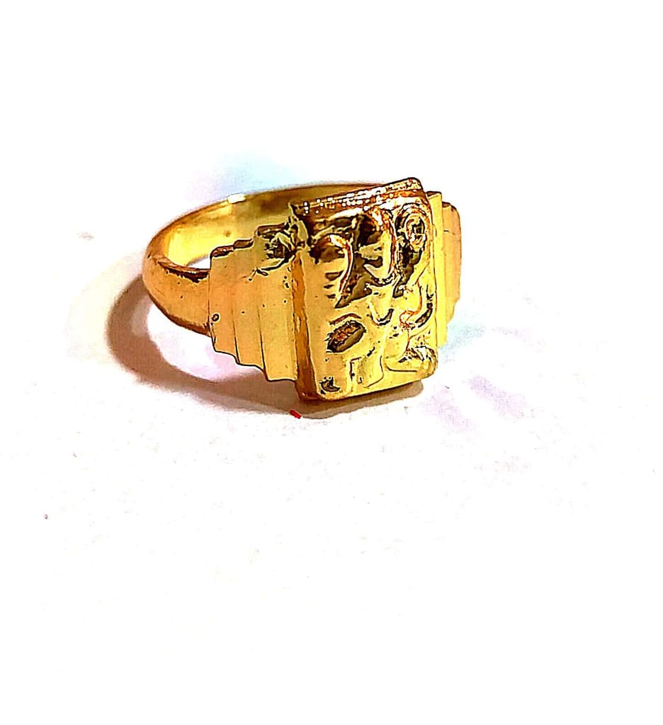 "Golden Ring with Intricate Design"
