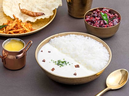 Curd and poriyal rice bowl