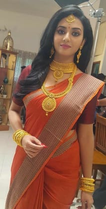Pleasant Dark Peach Colored Casual Wear Printed Soft Silk Saree