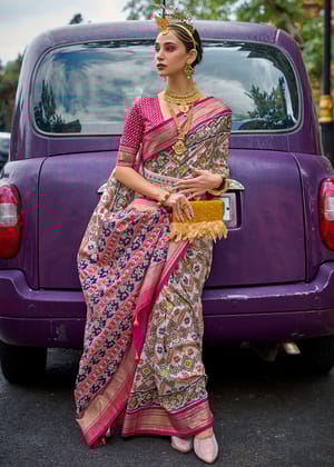 Adorning White And Pink Printed Patola Silk Saree