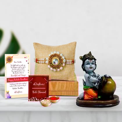 Designer Handcrafted Stone Pearl Rakhi with Decorative Showpiece of Makhan Chor and Roli Chawal Pack, Best Wishes Greeting Card