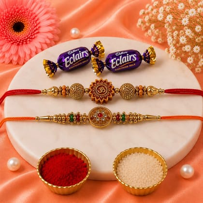 Traditional Rakhi Celebration Gift pack with 2 Designer Rakhis, Roli, Chandan, Chawal, Misri & 2 Cadbury Eclairs
