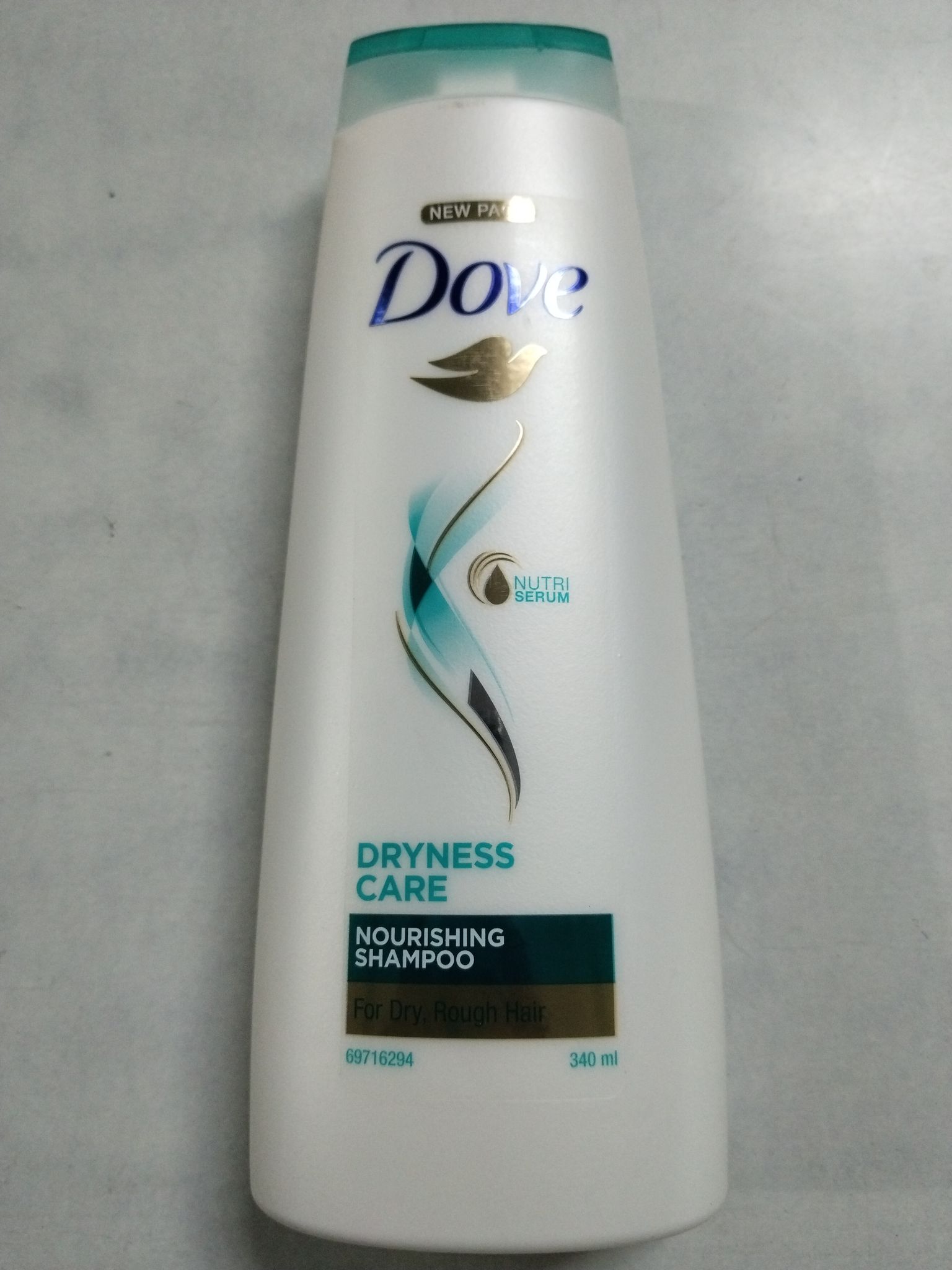 Dove dryness care nourishing shampoo 