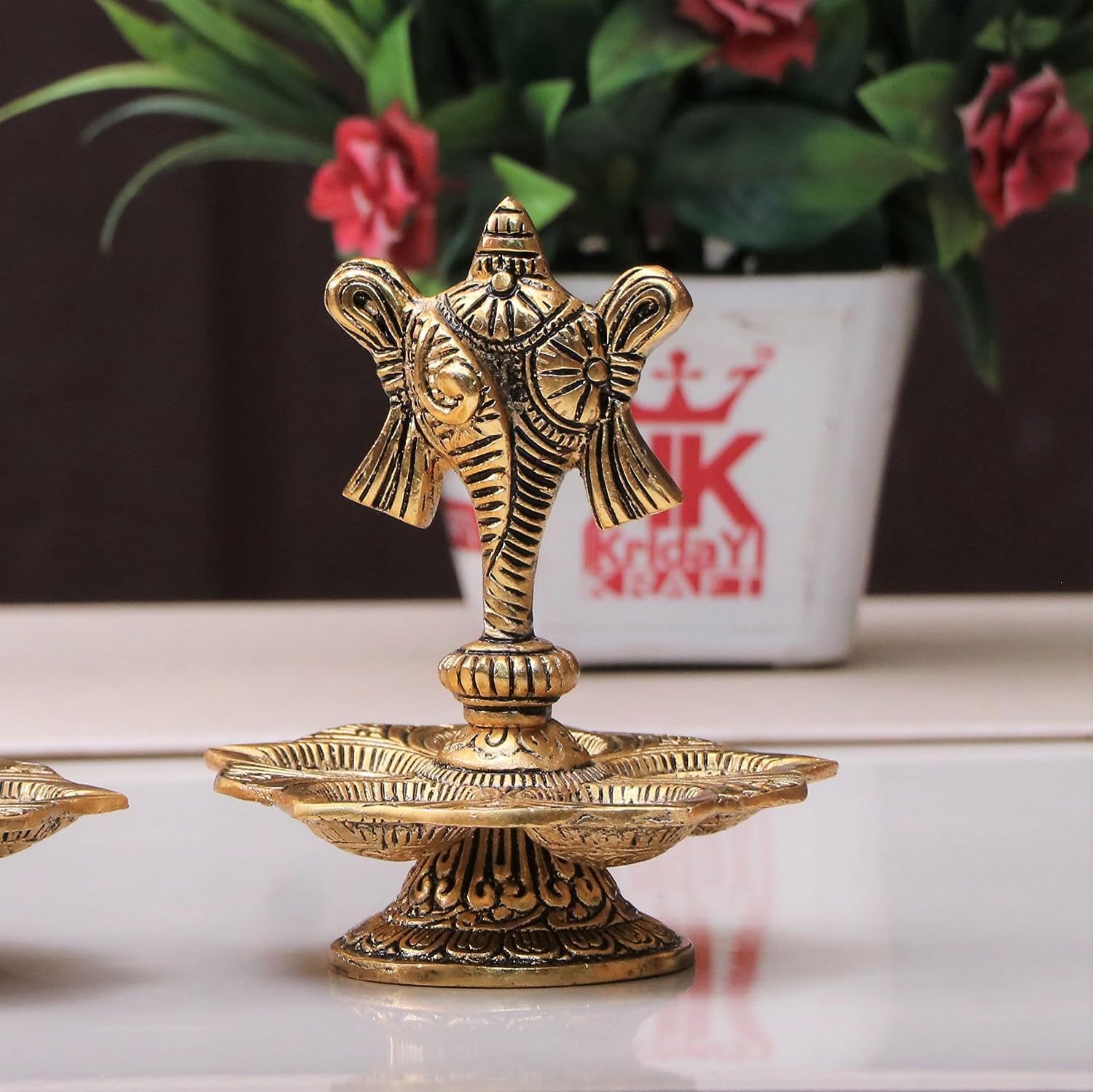 DreamKraft Metal Tirupati Balaji Panch Mukhi Diya with Shanku Stand | Gold Plated | Home & Office Pooja Decor | 11x11x12.5 cm