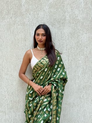 Pure dola silk fabric with beautiful dol zari  zari all over and hand bandej   zari havvy contrast bp suppr Saree