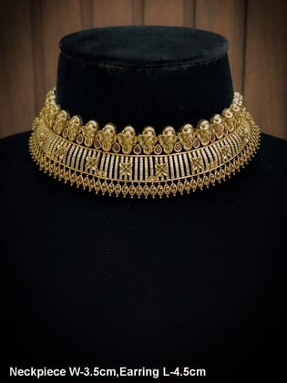 Ganpatiji motif's on top of AD studded choker with ruby and green stones flower