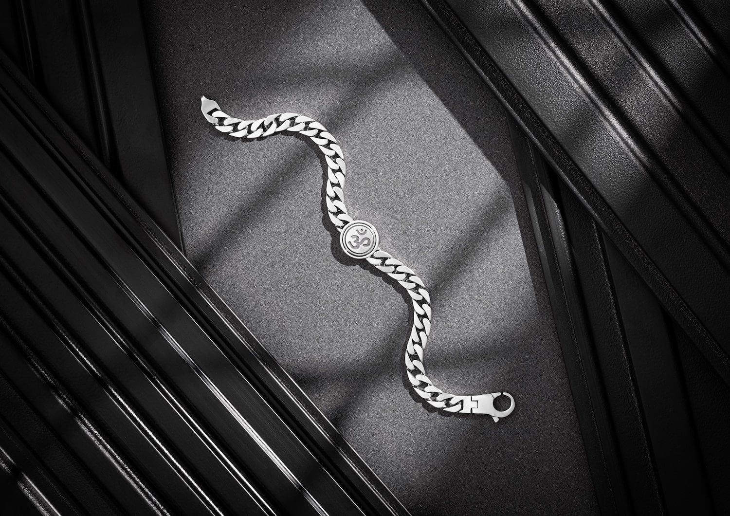 Revolving Luxe Om Bracelet