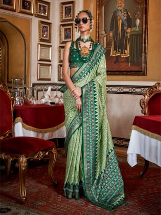 Pista Green Soft Silk Woven Printed Patola Designed Saree