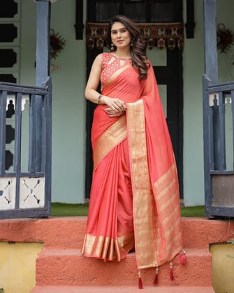 Graceful Coral Pink Plain Chiffon Saree with Gold Zari Border, Floral Embroidered Blouse & Tassel Detailing-Regular