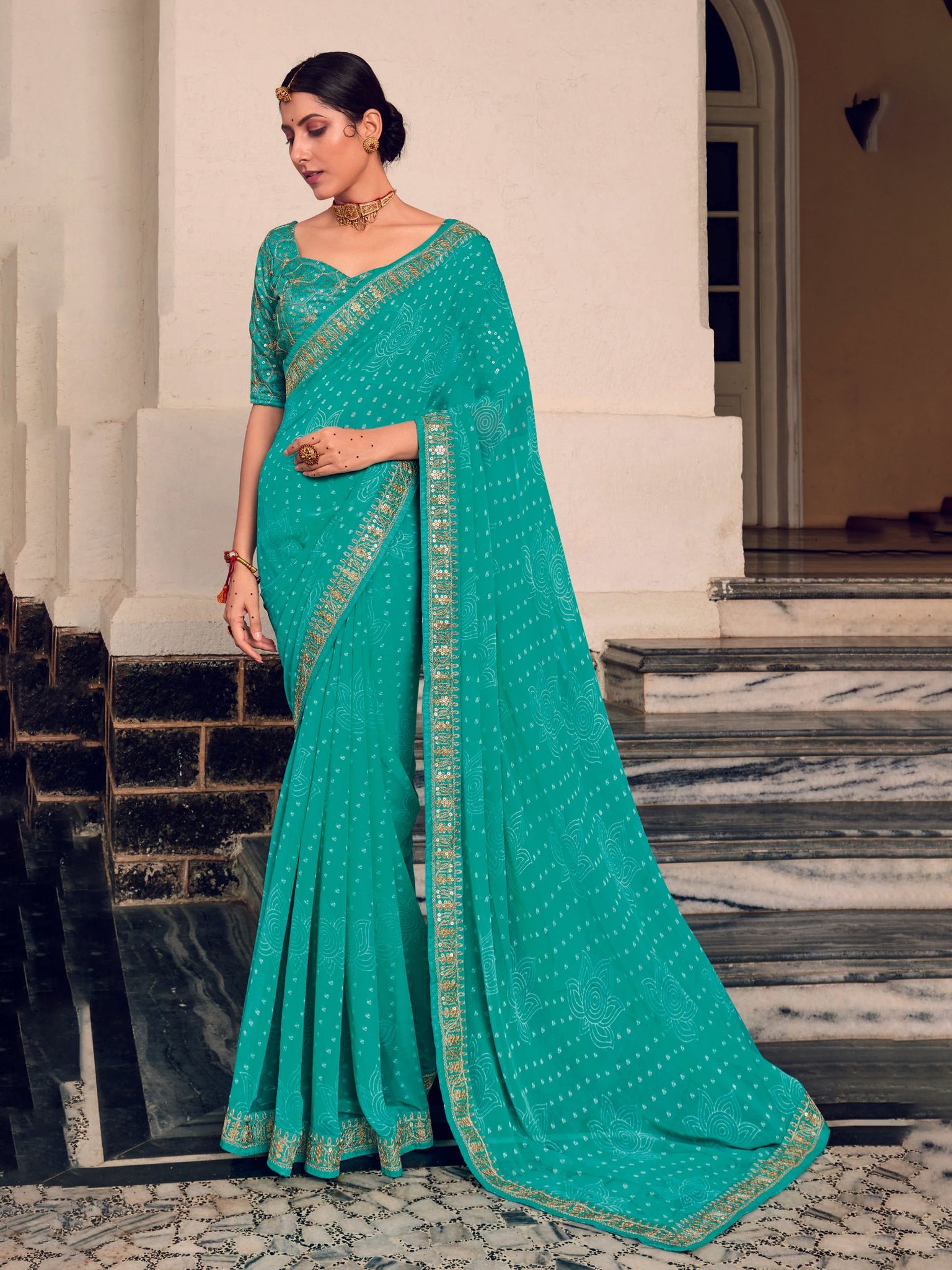 Turquoise Georgette bandhni Print Embroidery Border Saree
