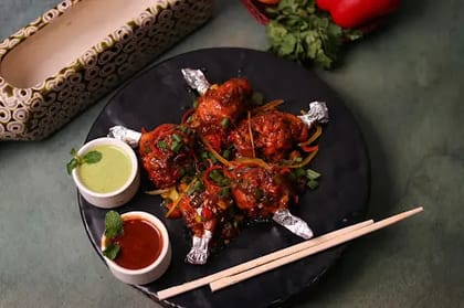 Chicken Lolipop In Hot Garlic Sauce