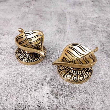 Brass Peeple Leaf Design Diya Pair - 1.5 inch Height | Decorative Brass Diya Pair with Peeple Leaf Design Brass Peeple Leaf Design Diya Pair - 1.5 inch Height | Decorative Brass Diya Pair with Peeple Leaf Design